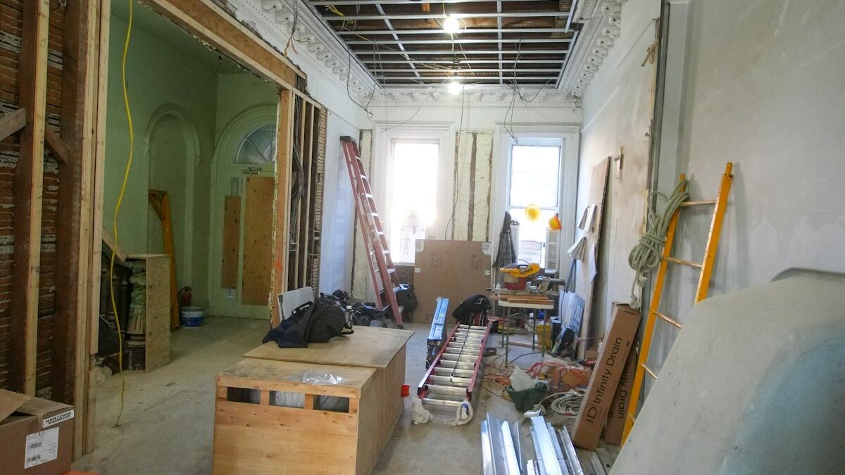 Interior renovation exposing older ceiling and wall materials